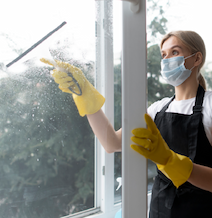 http://Cleaning%20window%20with%20squeegee