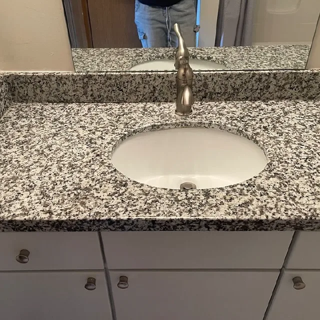 Clean granite bathroom vanity